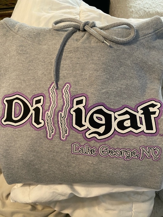 Dilligaf Tops - Dilligaf Grey Graphic Hoodie with Purple Accents from LAKE GEORGE NY